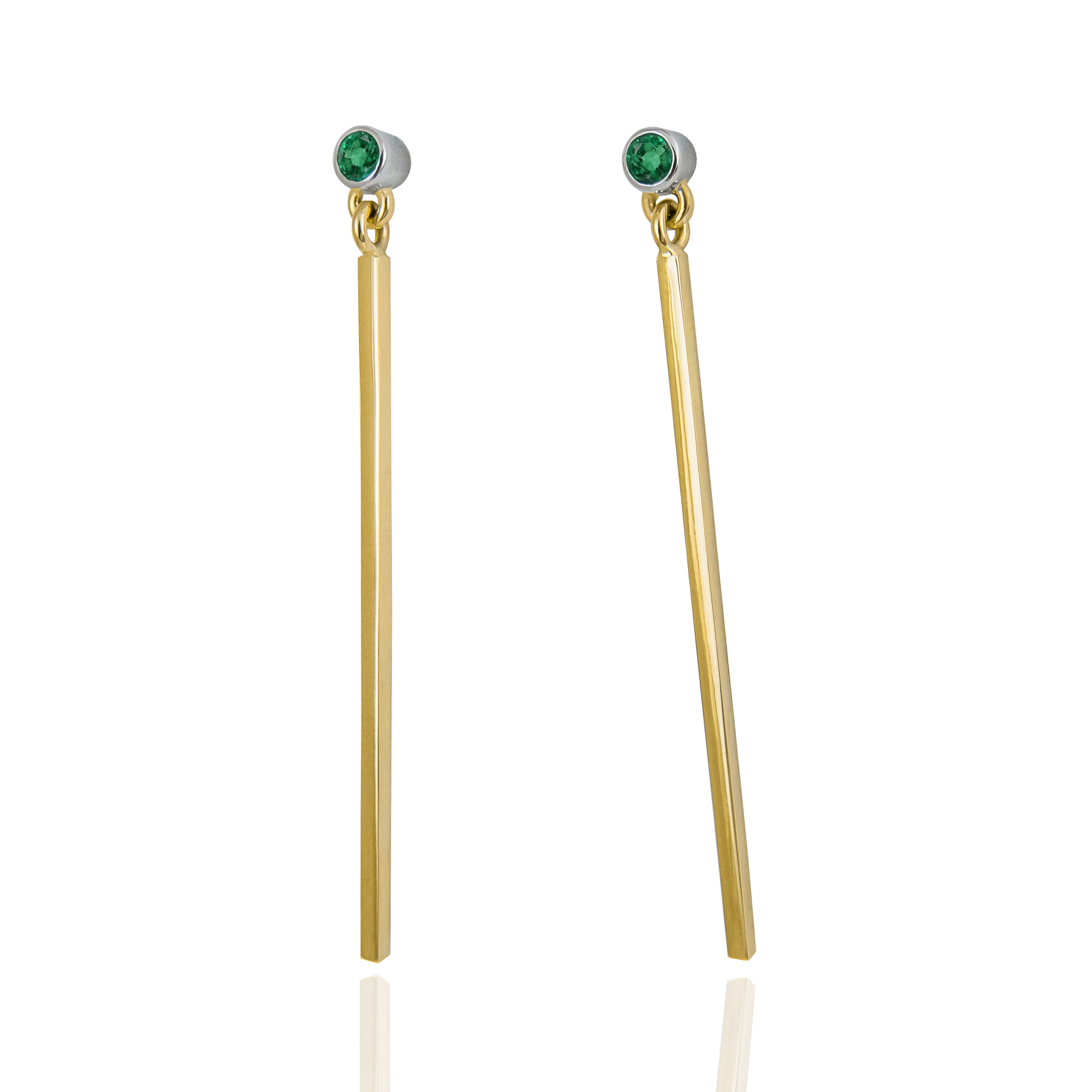 gold sticks with emerald